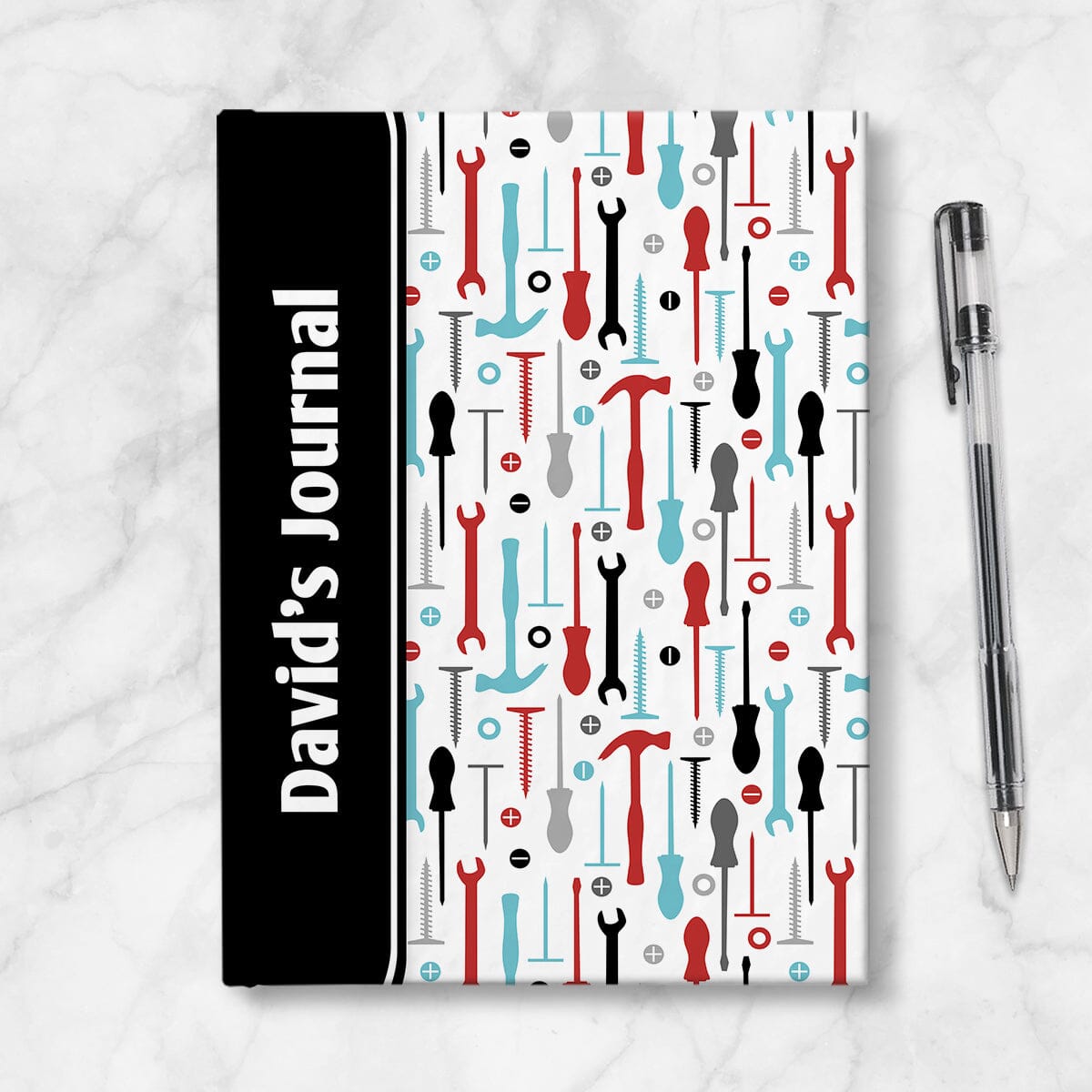 Personalized Red Turquoise Tools Pattern Journal at Artistically Invited. A custom book designed with a black color block wrapping around the spine area over an organized pattern of red, turquoise, black, and gray tools on the rest of the background. This handyman or contractor-inspired pattern includes hammers, screwdrivers, wrenches, nails, screws, and washers. Your personalized name and text of your choice is custom printed sideways in white over the black color block on the front near the spine.