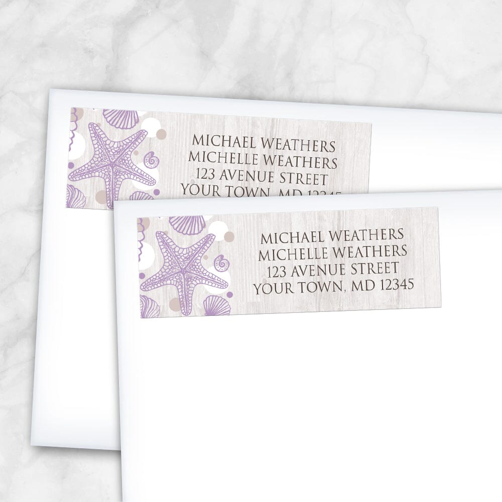 Seashell Whitewashed Wood Purple Beach Address Labels (shown on envelopes) at Artistically Invited. Modern and rustic seashell whitewashed wood purple beach address labels personalized with your return address. These beautiful address labels are designed with a purple seashell outline drawing, tan and white dots to the left side, over a light whitewashed wood background illustration. Your return address is personalized in a brown all-capital letters font over the whitewashed wood pattern.