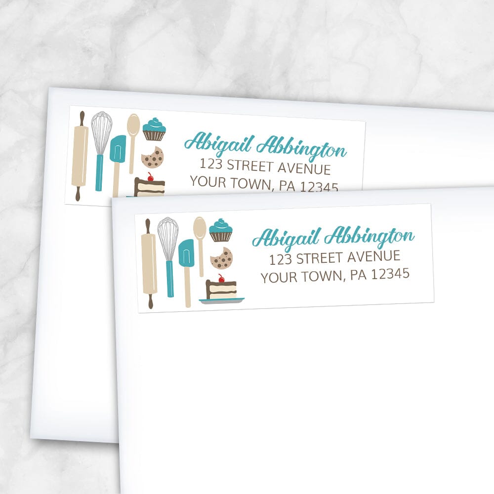 Turquoise Baking Address Labels at Artistically Invited. Image shows 2 labels on envelopes. High-quality address labels designed with cute kitchen baking tools and baked treats in turquoise, brown, gray, and beige on the left side over a white background. Your personalized return address is custom printed in turquoise and brown to the right of the turquoise baking tools and baked goods design. These premium return address labels are great for bakers, pastry chefs, or anyone who loves baking.