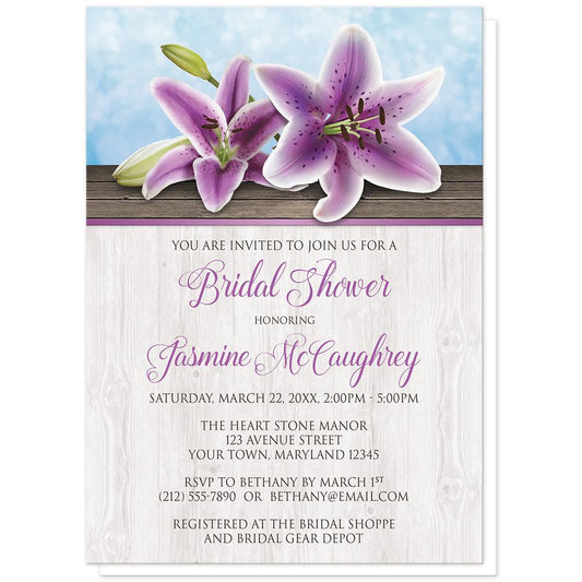Pretty Floral Wood Purple Lily Bridal Shower Invitation at Artistically Invited. Southern country-inspired pretty floral wood purple lily bridal shower invitations with two purple lilies on a light wood surface over a blue background design. Your personalized bridal shower celebration details are arranged in purple and dark brown over the light wood pattern.