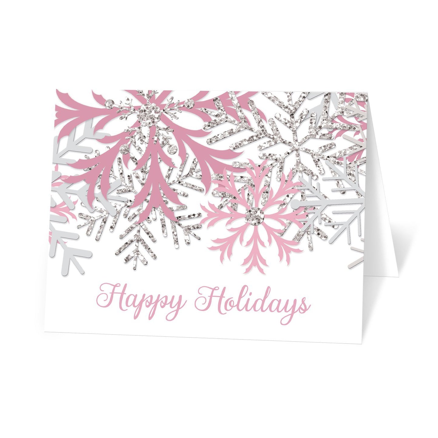 Winter Pink Silver Snowflake Holiday Cards at Artistically Invited. Modern winter pink holiday cards designed with pink, light gray, and silver glitter-illustrated snowflakes over a white background. 'Happy Holidays' is printed in a pink script font over the white below the snowflakes.