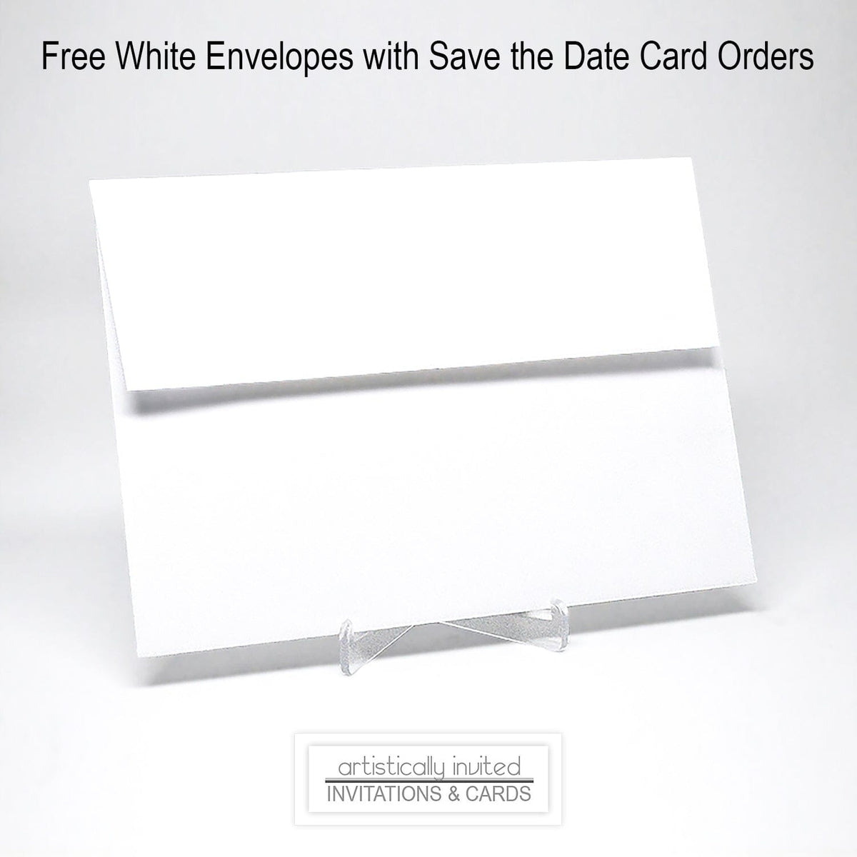 A white envelope standing upright on a clear display stand against a light gray background, with text at the top reading 'Free White Envelopes with Save the Date Card Orders'.