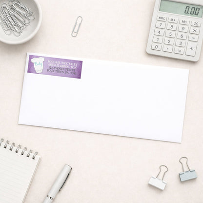 Baby Bodysuit on Purple Address Label shown on a white envelope with office supplies