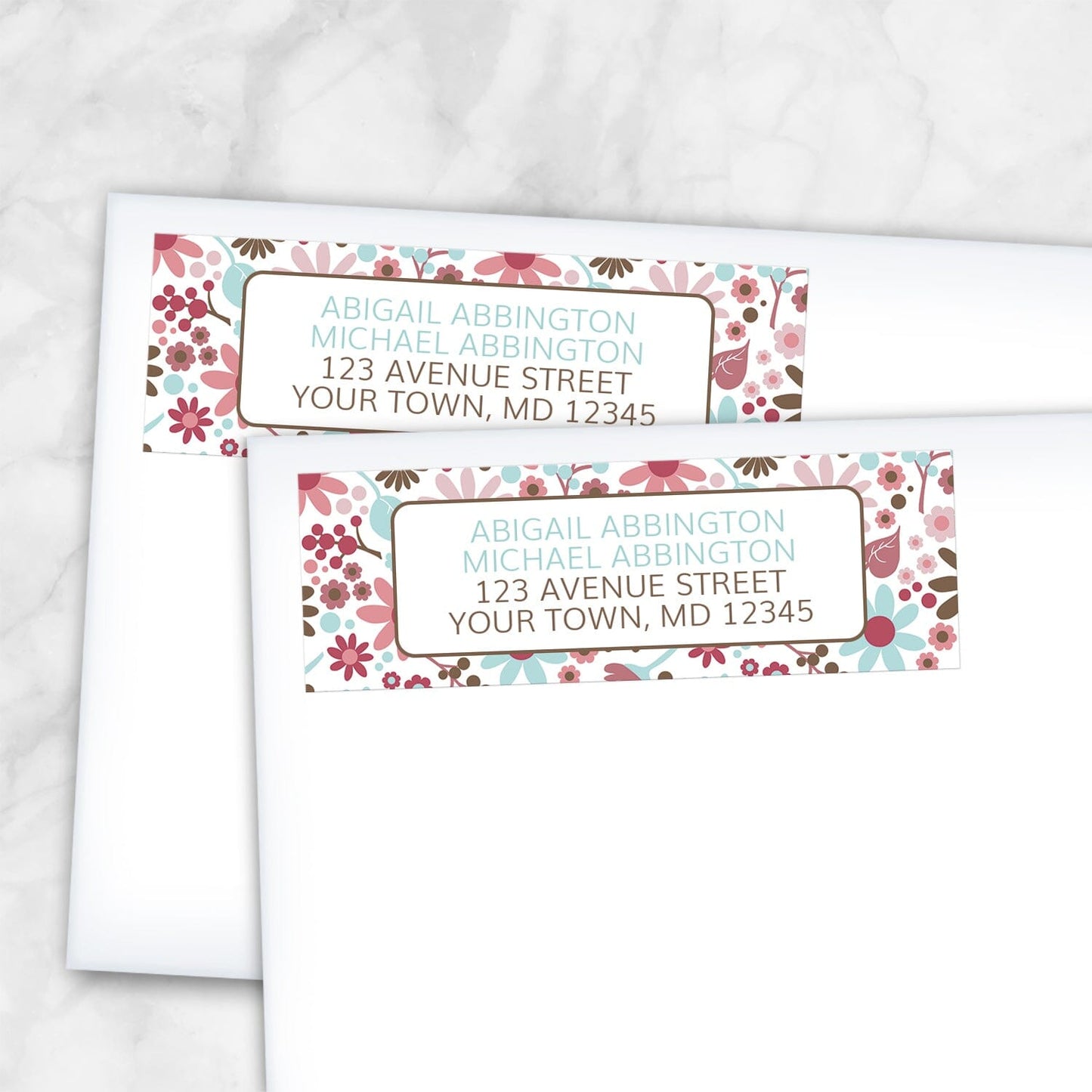 2 Berry Blue Summer Flowers Address Labels shown on white envelopes on a marble surface