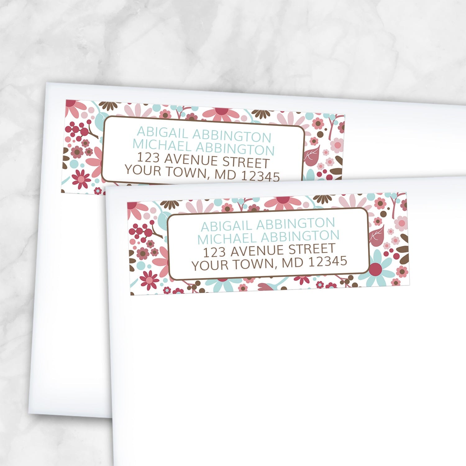 2 Berry Blue Summer Flowers Address Labels shown on white envelopes on a marble surface