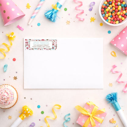Berry Blue Summer Flowers Address Label shown on a white envelope with party supplies