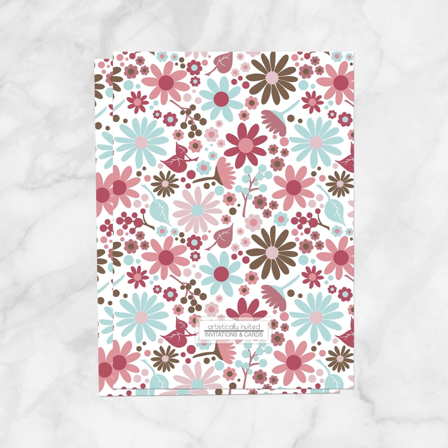 Backside of the bridal shower invitation with pink, blue, and brown flowers that is available when the printed upgrade is selected