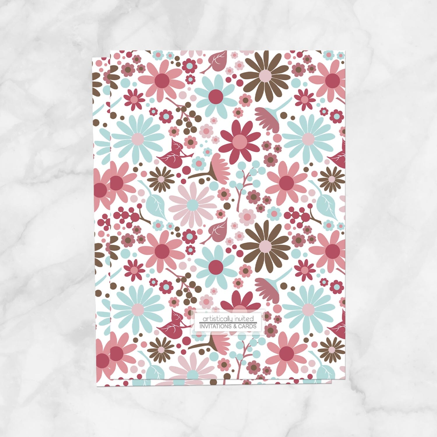 Backside of the bridal shower invitation with pink, blue, and brown flowers that is available when the printed upgrade is selected