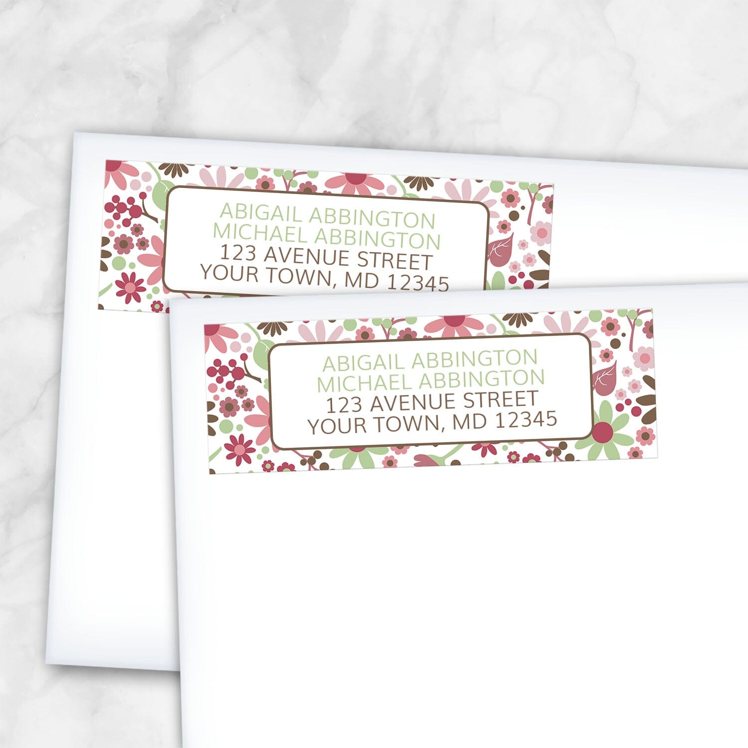 2 Berry Green Summer Flowers Address Labels shown on white envelopes on a marble surface