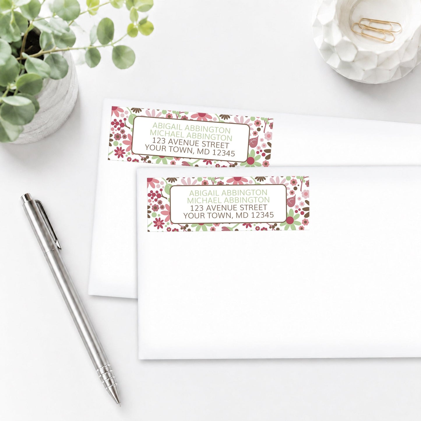 Berry Green Summer Flowers Address Labels on white envelopes with a pen and plant on a white surface