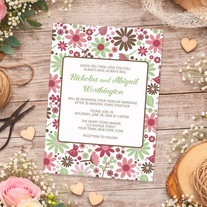 Berry Green Summer Flowers Vow Renewal Invitation shown on a wooden surface with spring and summer flowers, small wood hearts, lace, and twine.