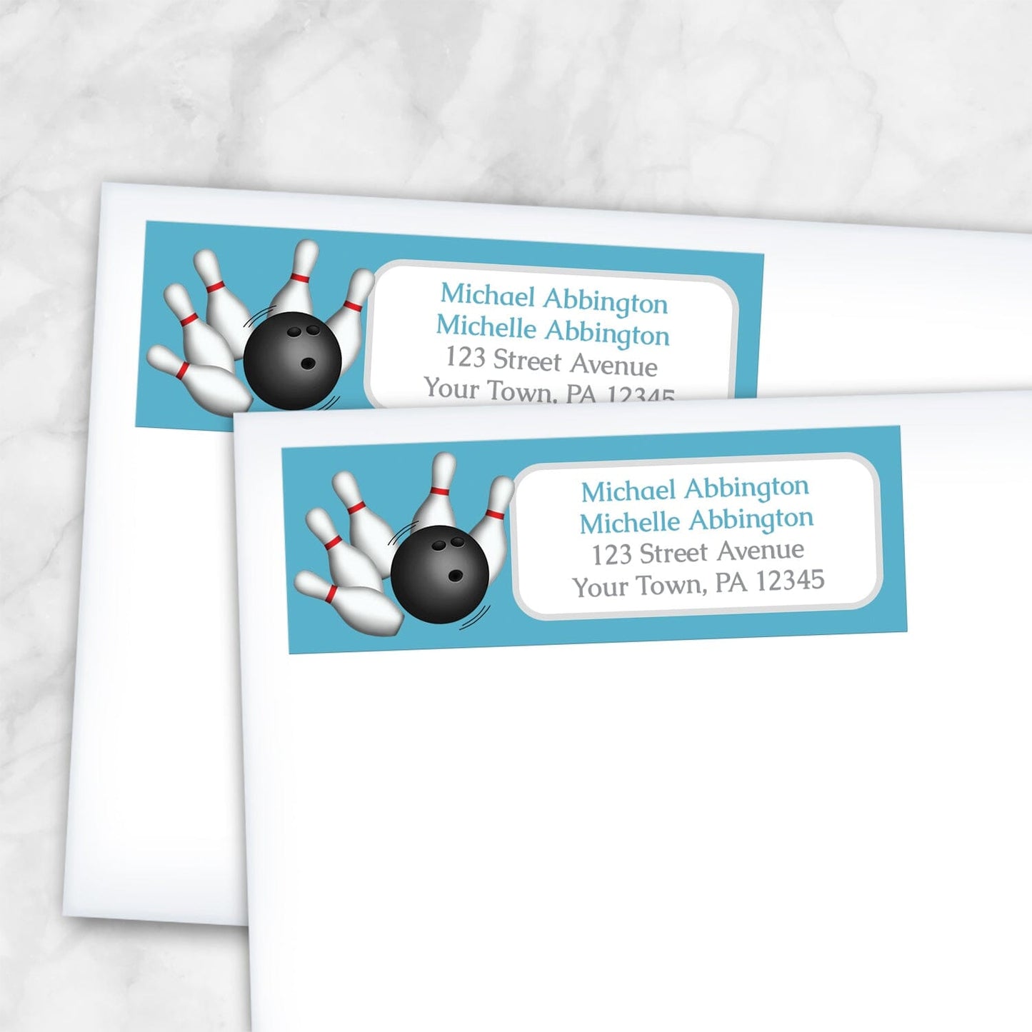 2 Blue Bowling Return Address Labels shown on white envelopes on a marble surface
