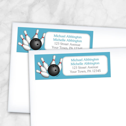 2 Blue Bowling Return Address Labels shown on white envelopes on a marble surface