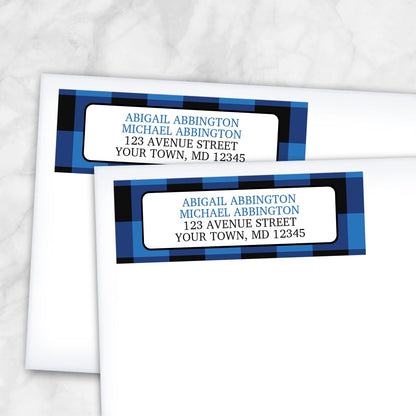2 Blue and Black Buffalo Plaid Address Labels shown on white envelopes on a marble surface