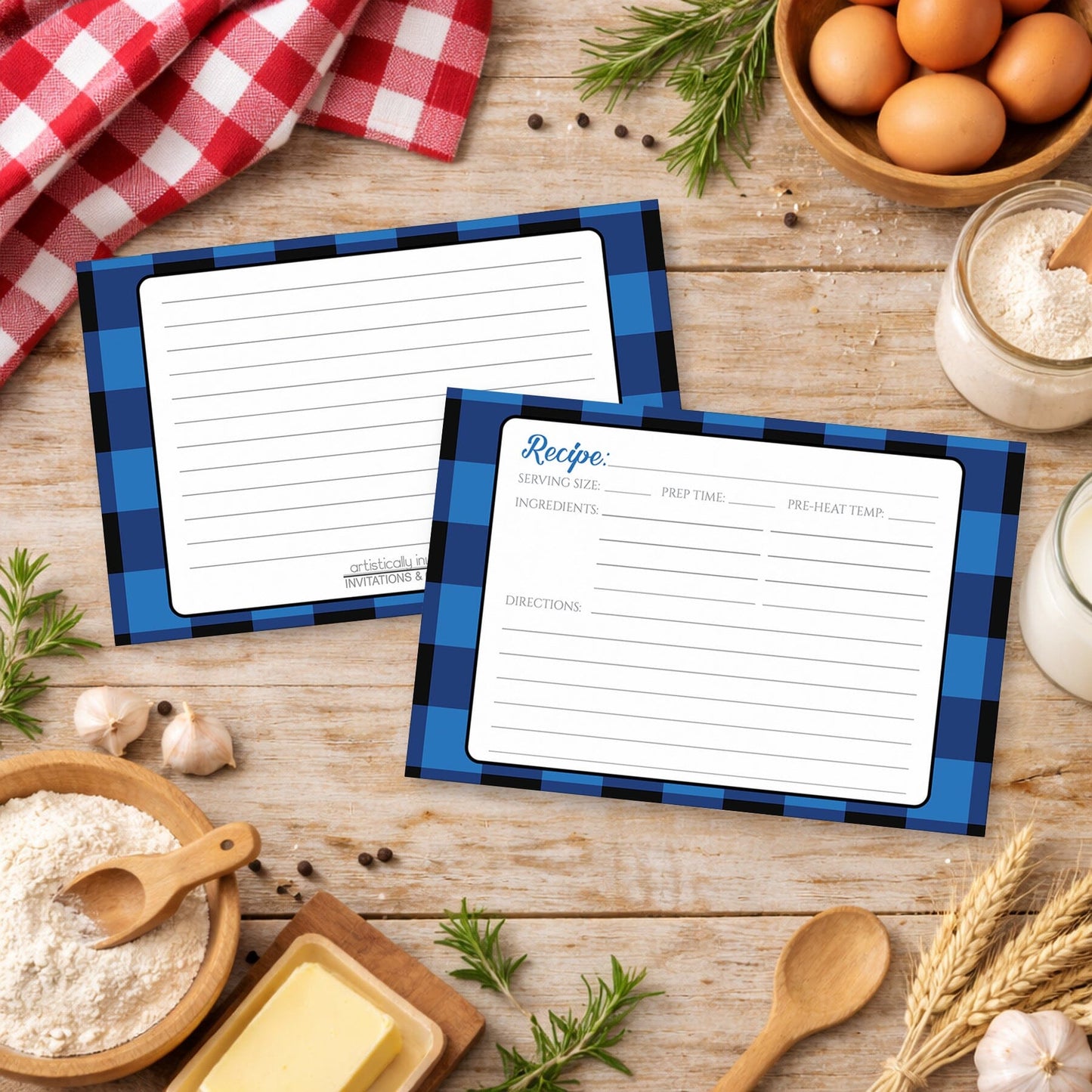 Two Blue and Black Buffalo Plaid Recipe Cards with blue checkered borders on a country wooden surface with cooking ingredients.