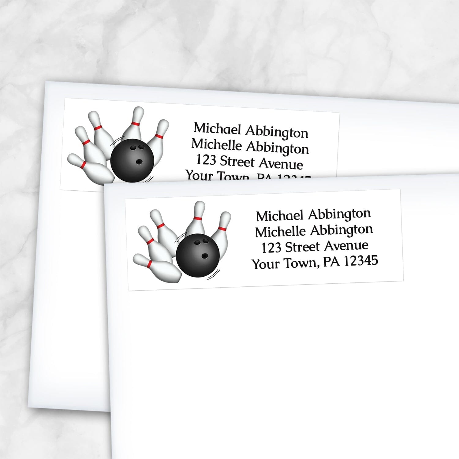 2 Bowling Ball and Pins Address Labels shown on white envelopes on a marble surface