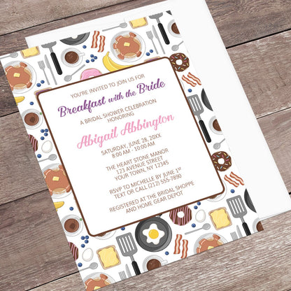 Invitation for 'Breakfast with the Bride' bridal shower, shown on a wooden surface