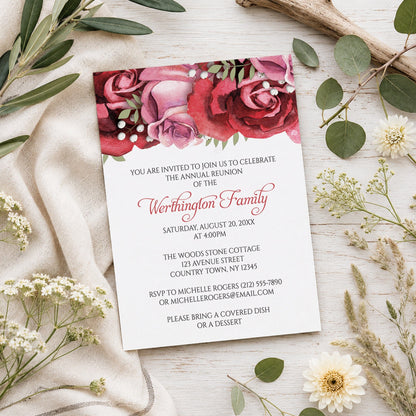 Burgundy Red Pink Rose Family Reunion Invitation shown on a wooden surface with spring and summer plants.