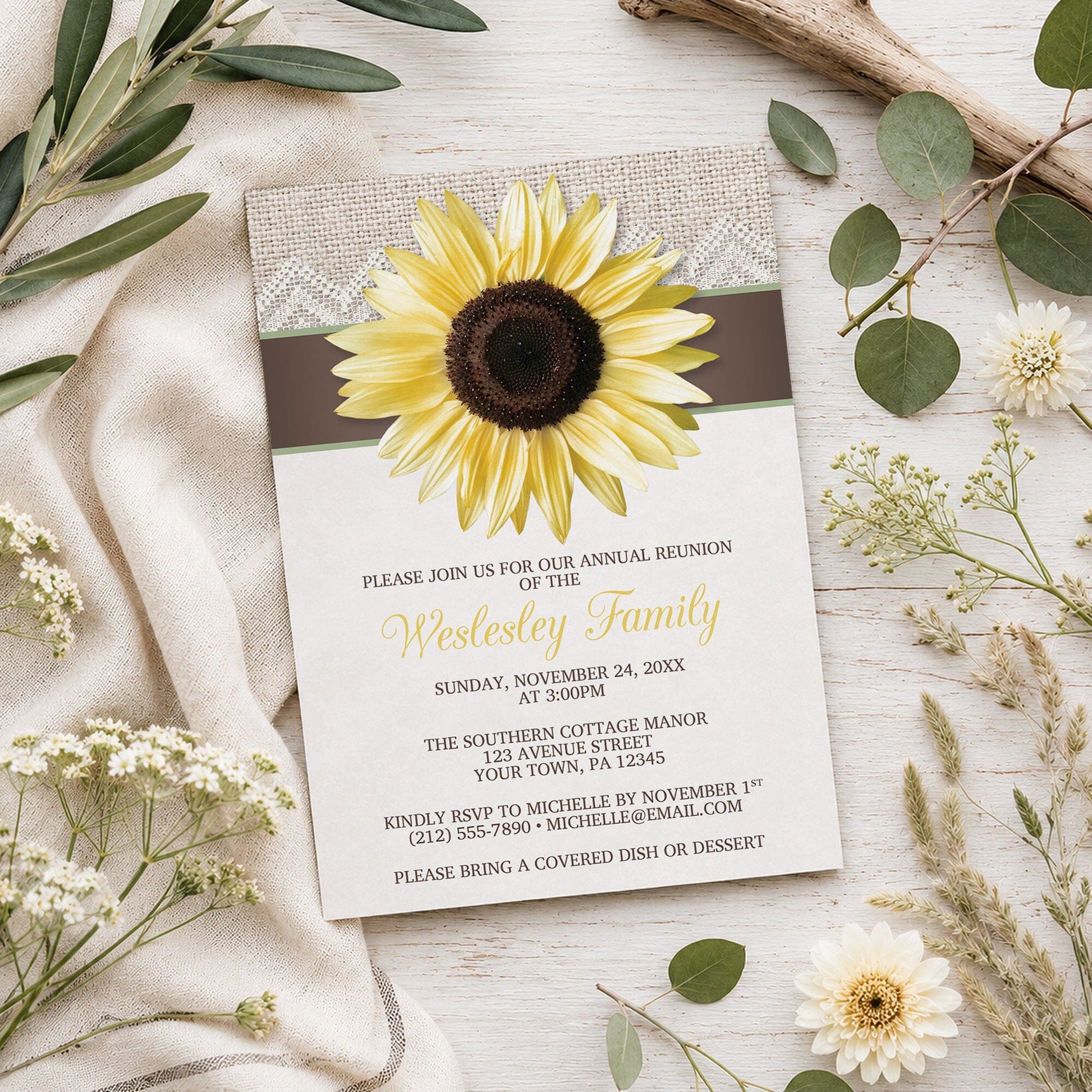 Burlap Lace Brown Sage Sunflower Family Reunion Invitation shown on a light wood surface with spring and summer plants.