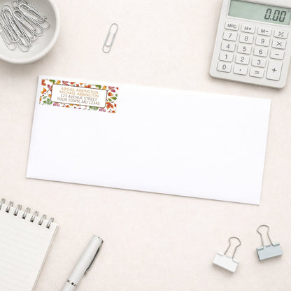 Changing Leaves Fall Address Label shown on a white envelope with office supplies