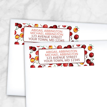 2 Cherries Address Labels shown on white envelopes on a marble surface