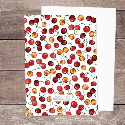 The back side of the Cherries Bridal Shower with the cherries pattern printed on the back when the printed invitations upgrade is purchased