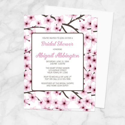 Bridal shower invitation with cherry blossom design on a white background