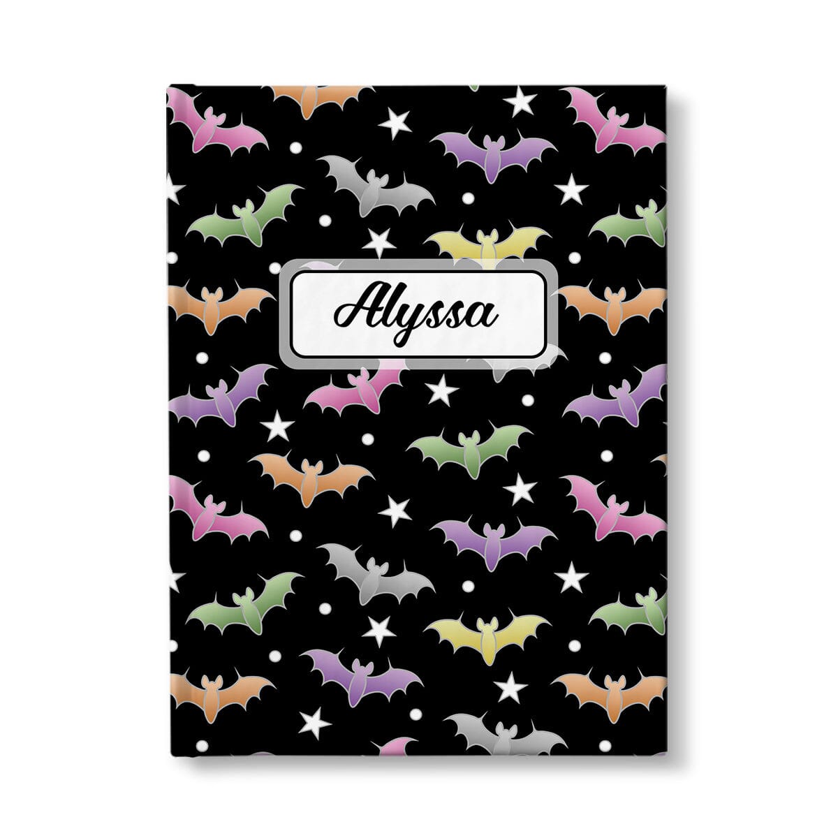 Colorful Bats Journal at Artistically Invited. A journal designed with a pattern of bats in different colors over a black background color that wraps around the book. Your personalized name is custom printed in a black script font in a white rectangular design over the bats pattern. Available with ruled lines or blank inside.