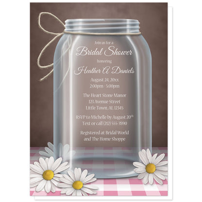 Country Mason Jar Daisy Gingham Bridal Shower Invitations at Artistically Invited. Country mason jar daisy gingham bridal shower invitations with an illustration of a glass mason jar with twine tied around the neck of it, and white and yellow daisies laying at the base of the jar on a pink gingham tabletop and over a vintage brown background. Your personalized bridal shower celebration details are custom printed in white within the mason jar illustration.