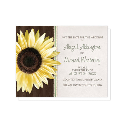 Country Sunflower Wood Brown Green Save the Date Cards at Artistically Invited. Country sunflower wood brown green save the date cards in a floral southern style, with a big yellow sunflower over a dark brown wood pattern illustration on the left side with burlap strips and green stripes beside it. Your personalized wedding announcement details are custom printed in green and brown over a beige parchment design to the right of the sunflower.