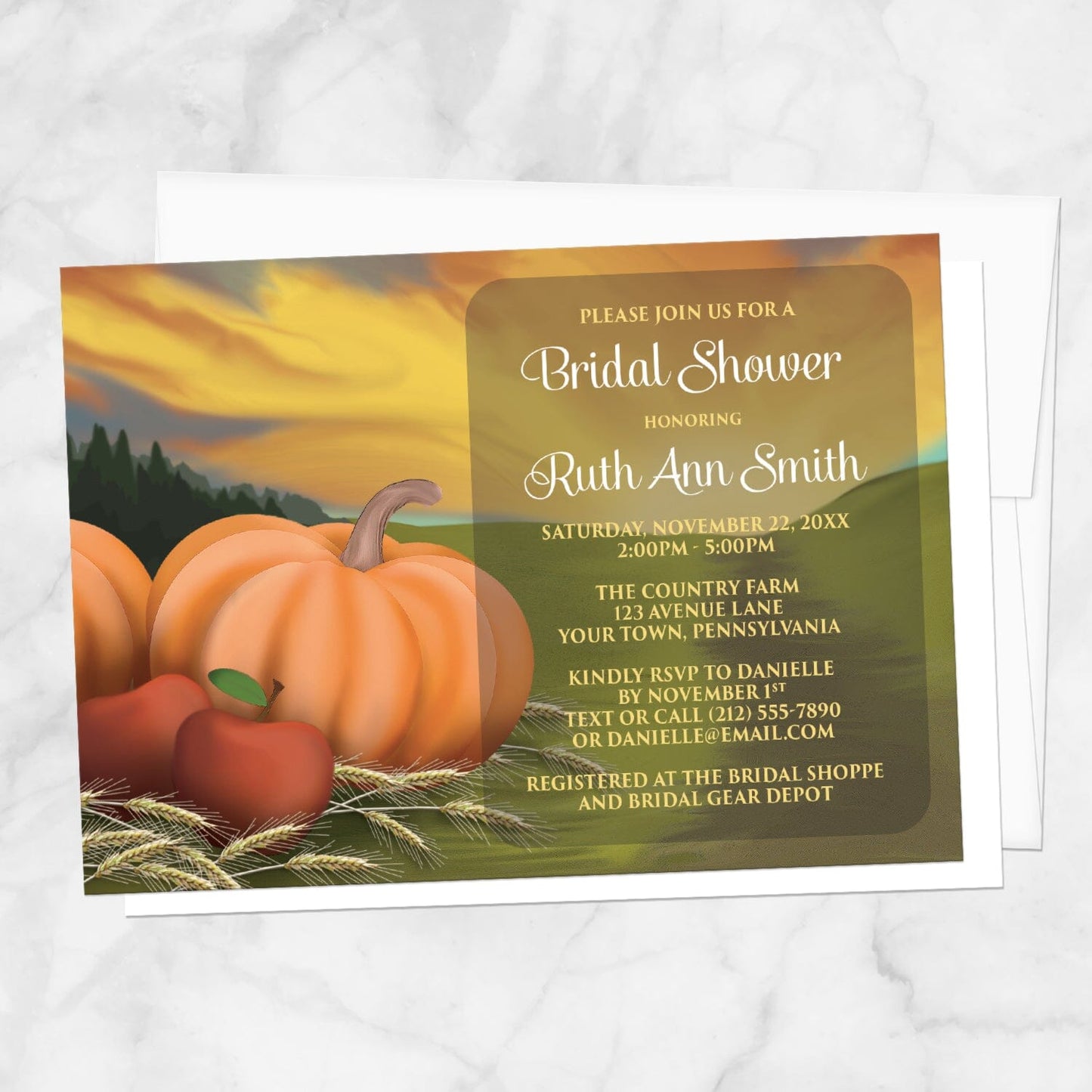 Country Autumn Harvest Bridal Shower Invitation with pumpkins and apples shown on a marble surface with a white envelope.
