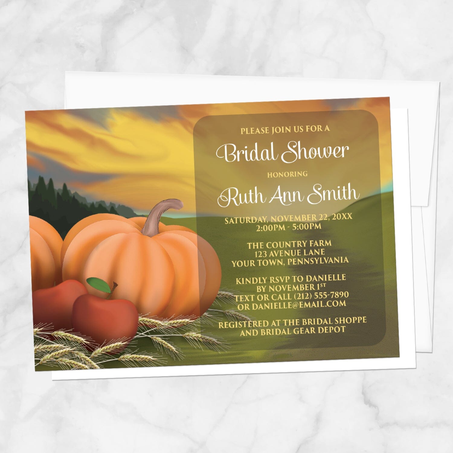 Country Autumn Harvest Bridal Shower Invitation with pumpkins and apples shown on a marble surface with a white envelope.