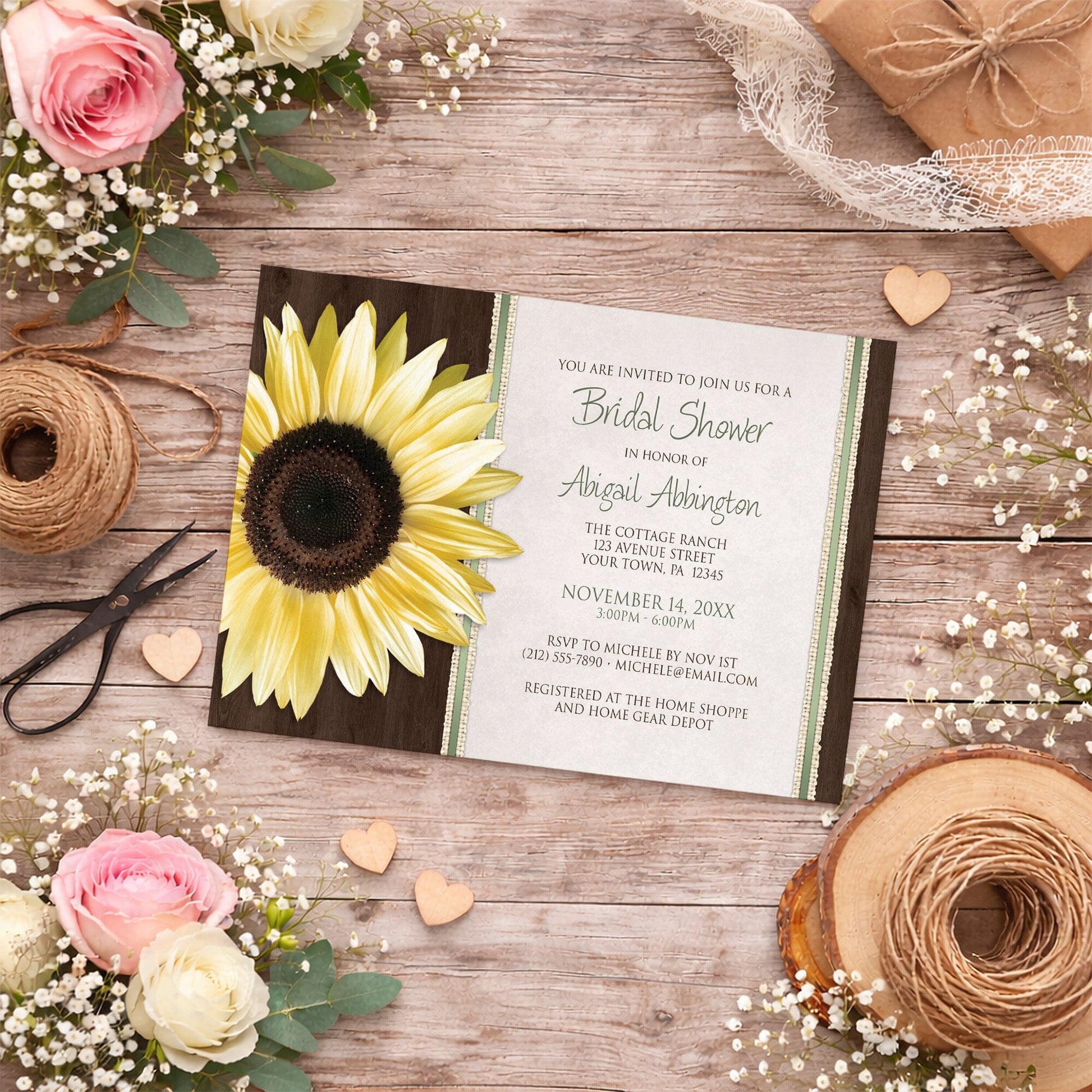 Sunflower-themed bridal shower invitation on a wooden surface with summer flowers, small wood hearts, and twine.