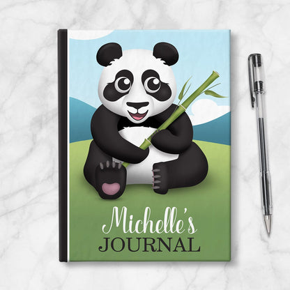 Personalized Cute Panda with Bamboo Journal at Artistically Invited. Image shows book on countertop with a pen next to it. 