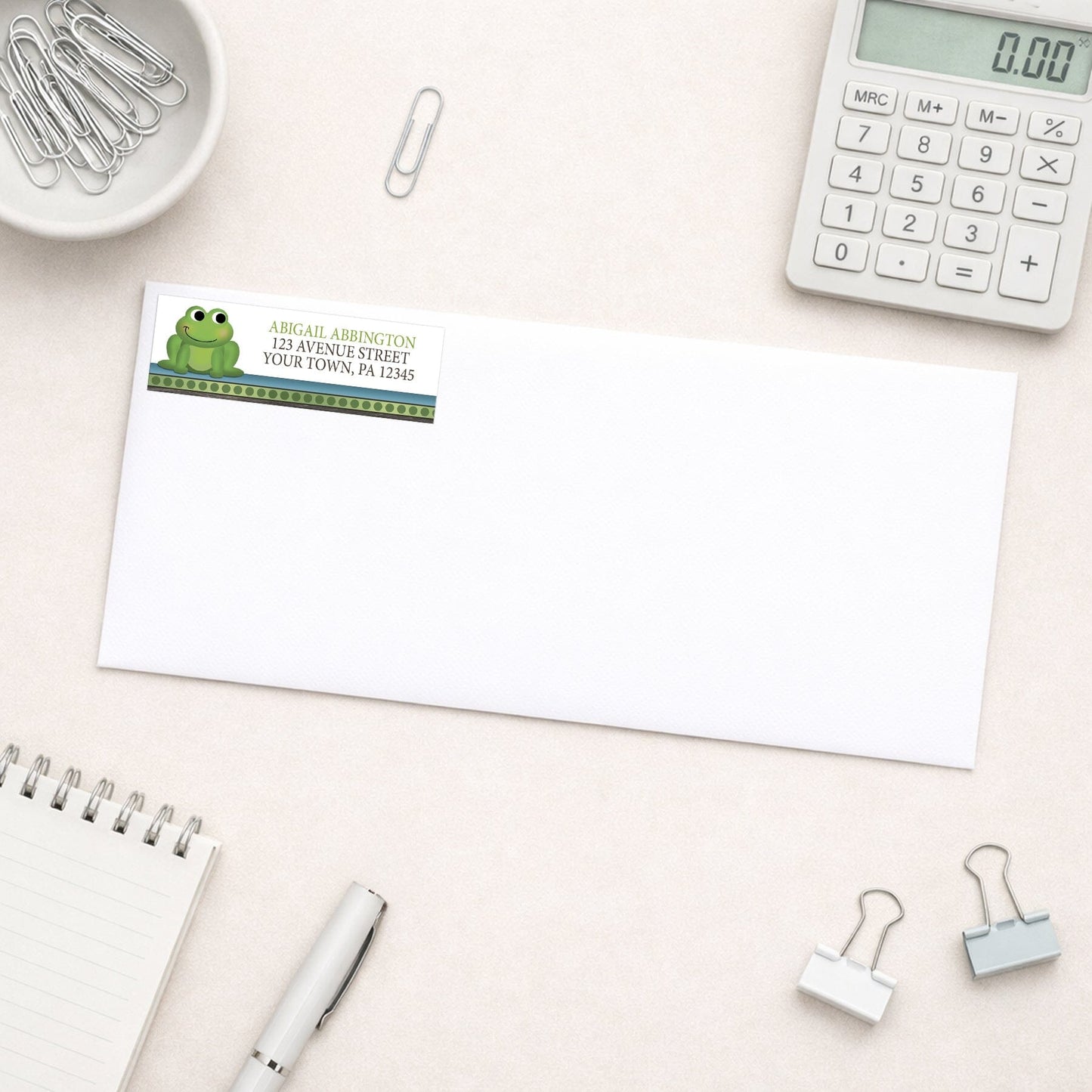 Cute Frog Green Rustic Brown Address Label shown on a white envelope with office supplies