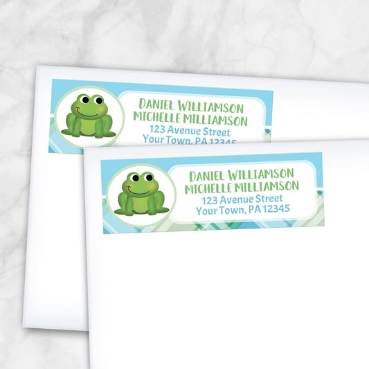 2 Cute Frog Green and Blue Plaid Address Labels shown on white envelopes on a marble surface
