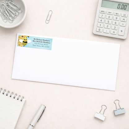 Cute Honeycomb Bee Address Label shown on a white envelope with everyday office supplies