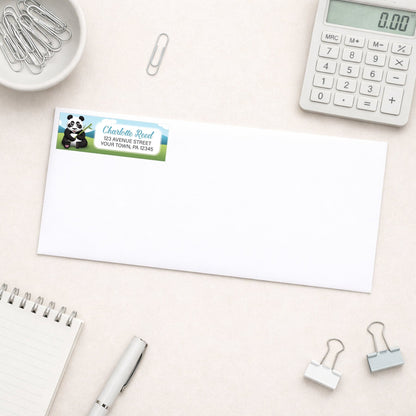 Cute Panda with Bamboo Address Label shown on a white envelope with everyday office supplies