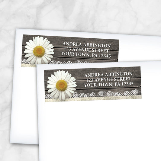 2 Daisy Burlap and Lace Wood Address Labels shown on white envelopes on a marble surface
