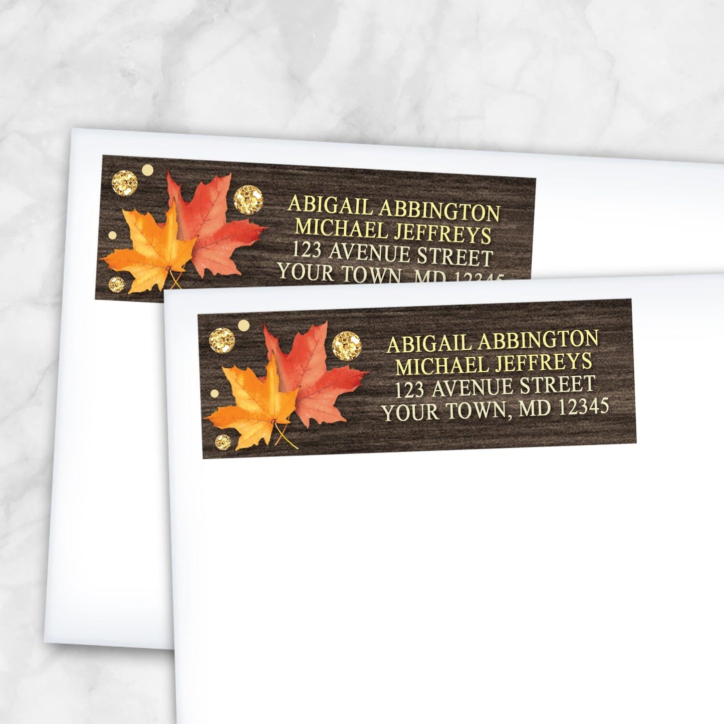2 Falling Leaves with Gold Autumn Address Labels shown on white envelopes on a marble surface