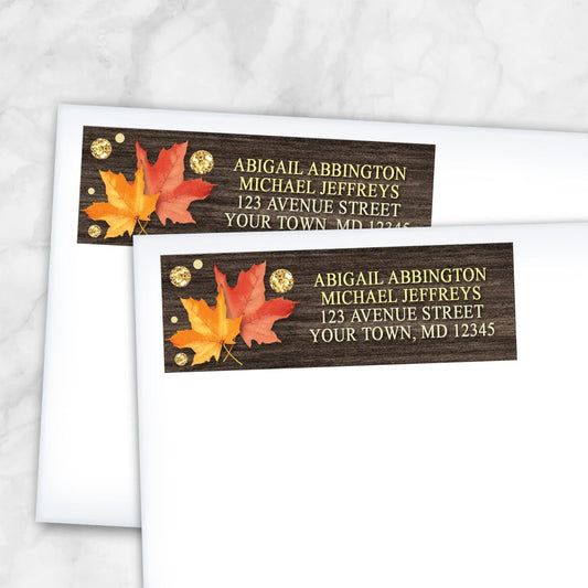 2 Falling Leaves with Gold Autumn Address Labels shown on white envelopes on a marble surface