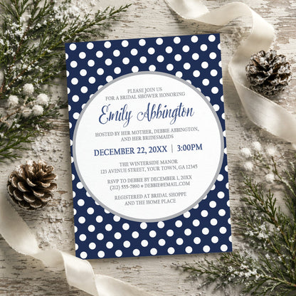 Gray Navy Blue Polka Dot Bridal Shower Invitation on a rustic wooden background with winter greenery and ribbons.