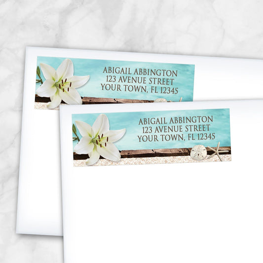 Two Lily Seashells and Sand Beach Address Labels shown on white envelopes