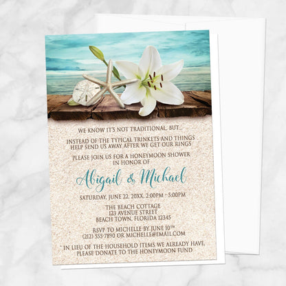 Lily Seashells and Sand Beach Honeymoon Shower Invitation shown on a marble surface with a white envelope.
