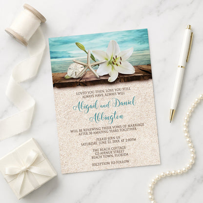 Lily Seashells and Sand Beach Vow Renewal Invitation on a white surface with a white gift box, pen, pearls, and ribbon.