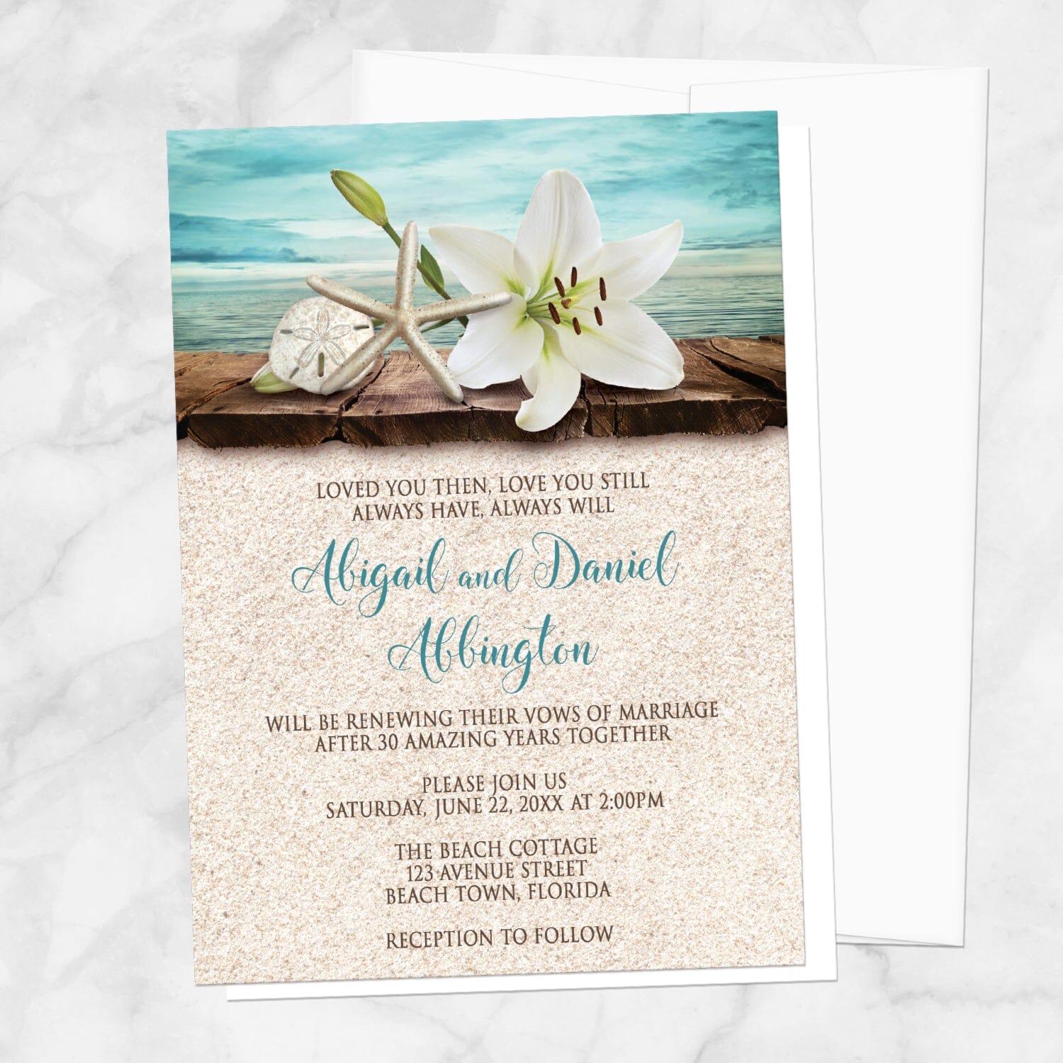 Lily Seashells and Sand Beach Vow Renewal Invitation shown on a marble surface with a white envelope.