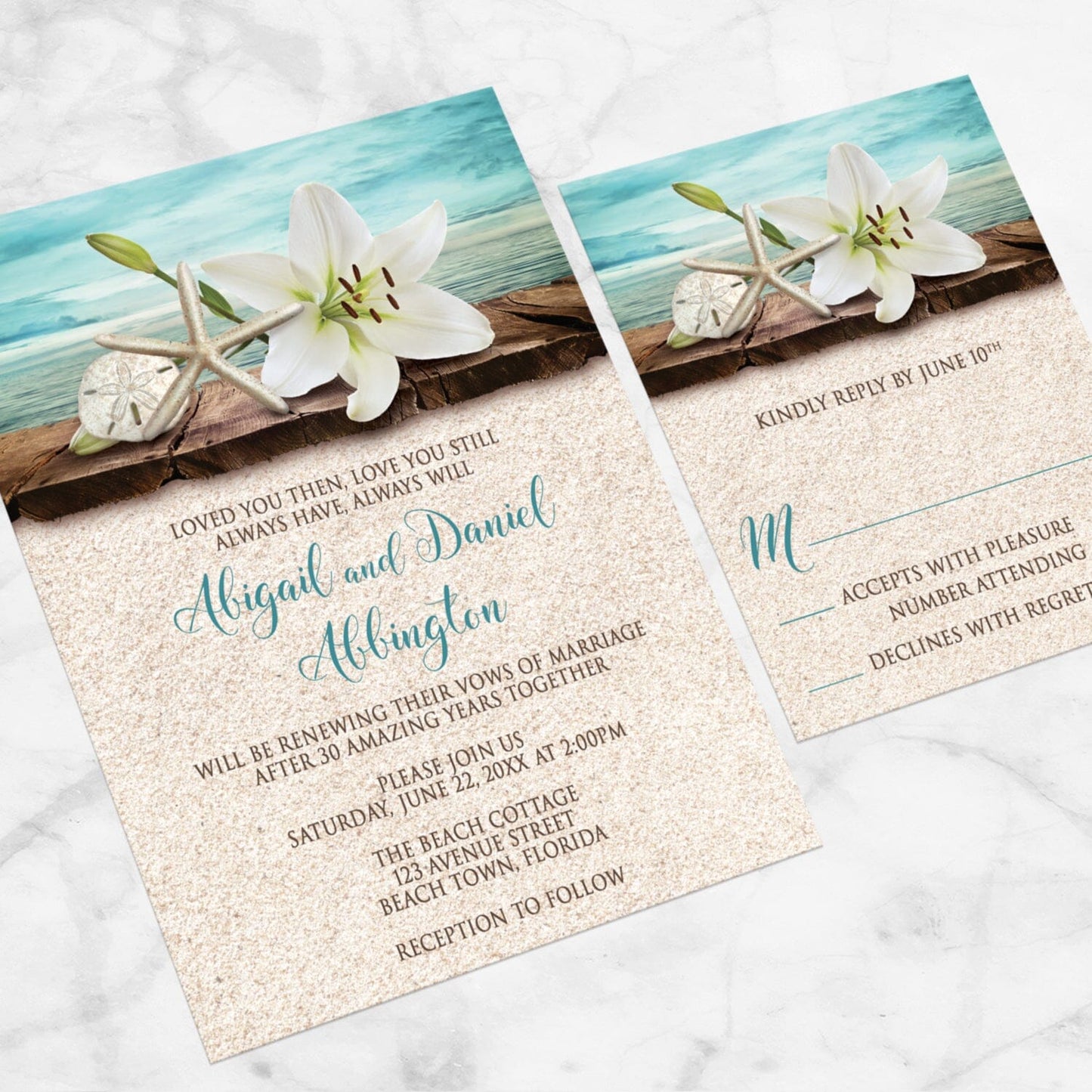 Lily Seashells and Sand Beach Vow Renewal Invitation shown at an angle on a marble surface with a matching RSVP card.
