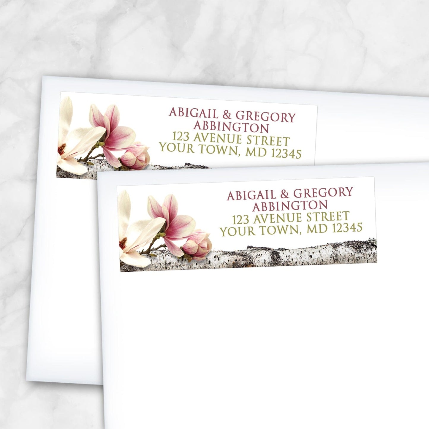 2 Magnolia Birch Light Floral Address Labels shown on white envelopes on a marble surface