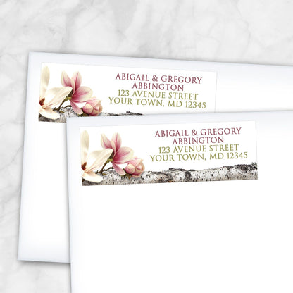 2 Magnolia Birch Light Floral Address Labels shown on white envelopes on a marble surface
