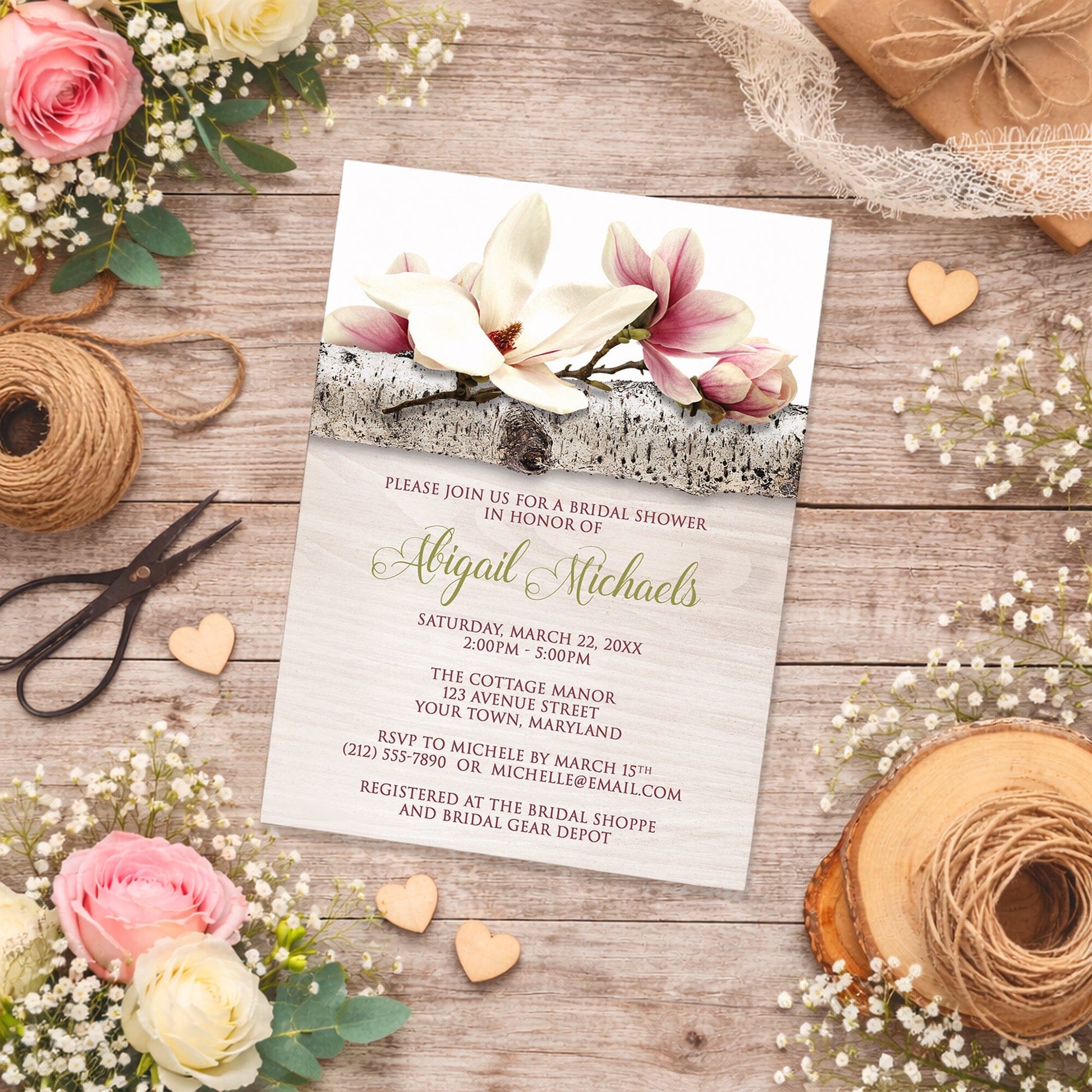 Magnolia Birch Light Wood Floral Bridal Shower Invitation on a wooden surface with flowers and twine.